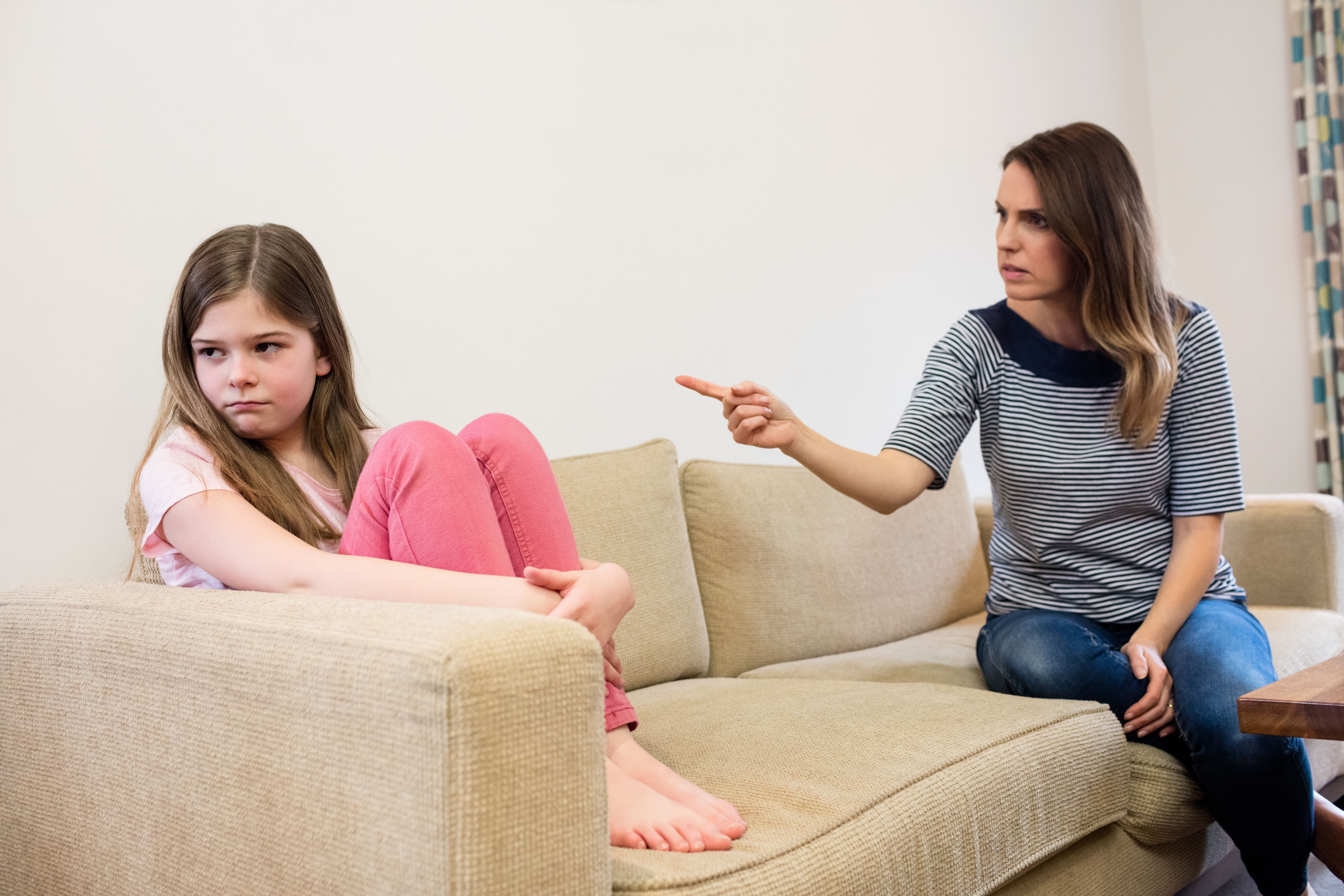 daughter-ignoring-her-mother-after-argument-living-room (1).jpg